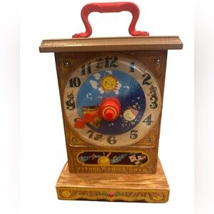 1964 Fisher Price toy # 997 wooden tie rock teaching clock
